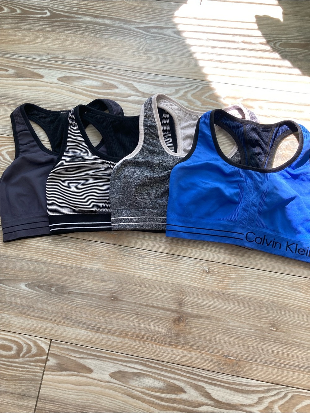 Set of 4 Calvin Klein Racerback Sports Bras -Blue, Heather, Black, Striped Small - Picture 2 of 3